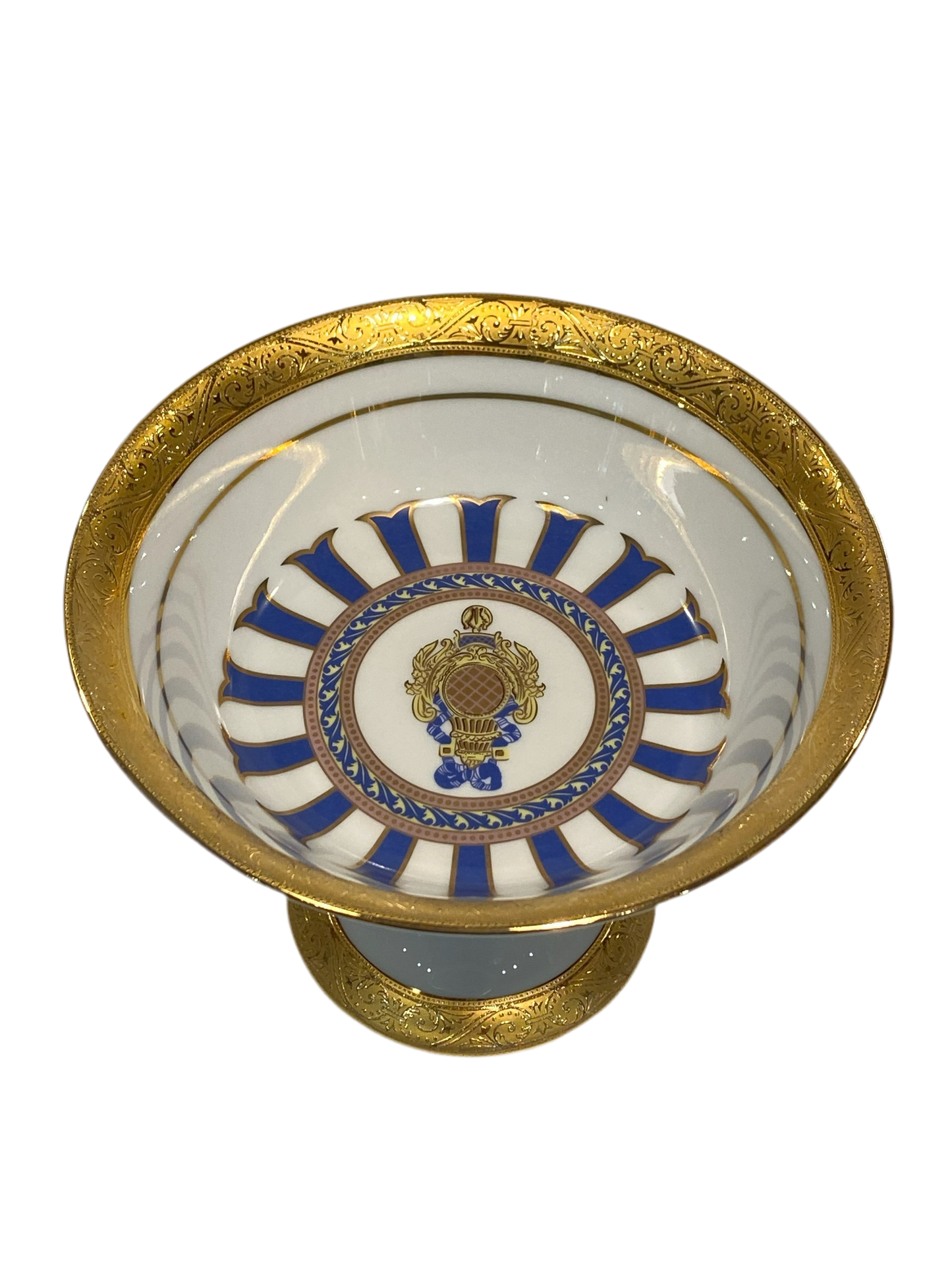 Alzata tonda in porcellana Limoges con decoro in oro zecchino e blu. Dimensioni: cm ø 18,5 x h 13,5. In negozio e online su tuttochic.it