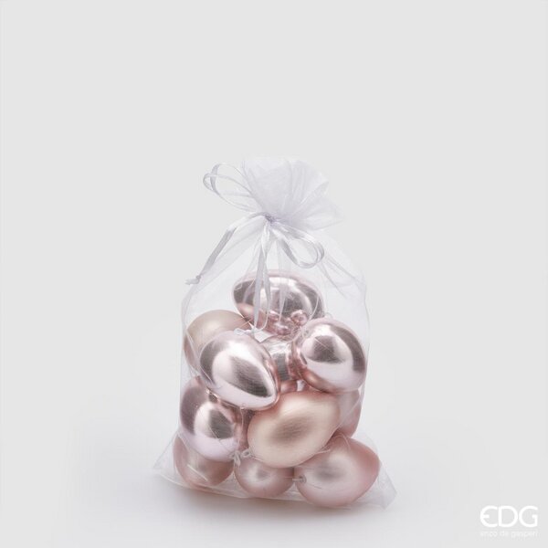 Sacchetto contenente 12 uova in plastica di colore rosa, 6 lucide e 6 opache. Dimensioni singolo uovo: h 6 cm. In negozio e online su tuttochic.it
