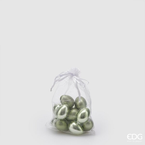 Sacchetto contenente 12 uova in plastica di colore verde, 6 lucide e 6 opache. Dimensioni singolo uovo: h 4 cm. In negozio e online su tuttochic.it