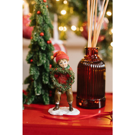 Personaggi natalizi bimba e bimbo in resina per mensole