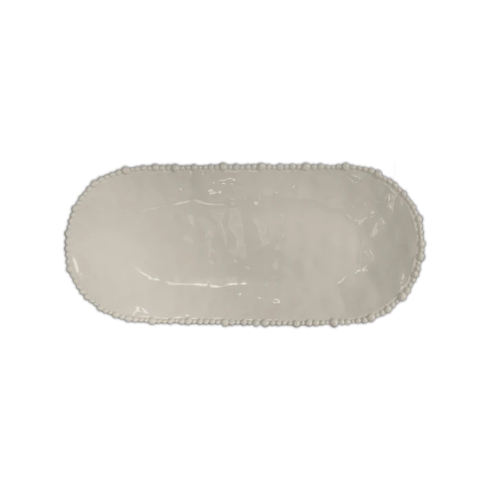 Piatto a Servire ovale in melamina di colore tortora dell'innovativa collezione Joke. Tonalità pastello e caratteristico bordo rivestito di micro sfere ornamentali fanno della linea in melamina un ottimo alleato per la tavola. Dimensioni: 53 x 24 cm. Lavabile in Lavastoviglie. In negozio e online su tuttochic.it