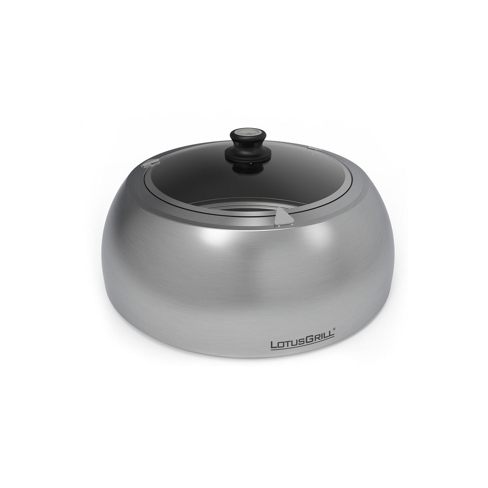 Cappa per LotusGrill in acciaio inox con una parte di superficie in vetro temprato trasparente. Consente una cottura veloce e costante grazie a una migliore distribuzione del calore. Grazie alla cappa si può cuocere, arrostire e cucinare alla griglia a bassa temperatura. In negozio e online su tuttochic.it