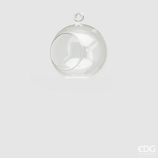 Portacandela sfera da tavolo in vetro trasparente, con asola superiore per poterlo appendere. Dimensioni: ø cm 8. In negozio e online su tuttochic.it