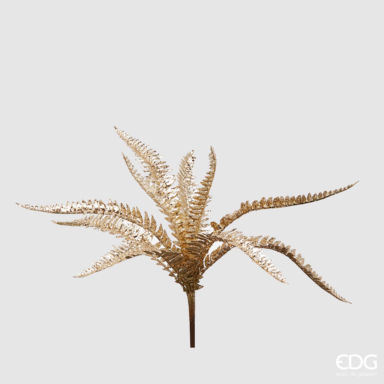 Ramo di Felce ornamentale artificiale con glitter oro. Dimensioni: altezza cm 38. In negozio e online su tuttochic.it