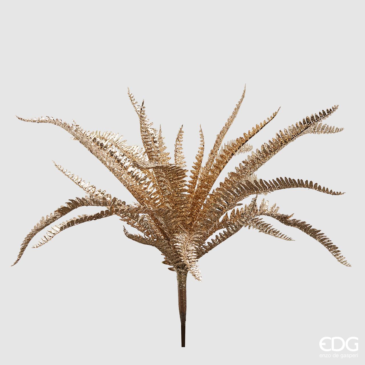 Ramo di Felce ornamentale artificiale con glitter oro. Dimensioni: altezza cm 56. In negozio e online su tuttochic.it