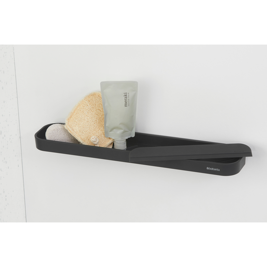 Mensola portaoggetti per doccia con tergivetro MindSet grigio scuro di Brabantia. Il portaoggetti può contenere shampoo, gel ecc.. Il tergivetro è fatto per pulire senza sforzo la porta della doccia e le piastrelle. Peso0.4 kg Altezza: 7,3 cm Lunghezza: 9 cm Larghezza : 42,1 cm. In negozio e online su tuttochic.it