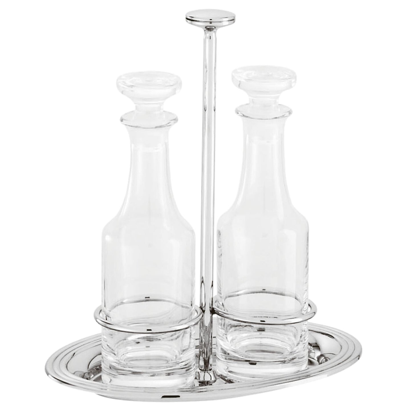 Servizio oliera e acetiera in acciaio argentato e cristallo della collezione Elite di Sambonet. Provvedere ad una lucidatura con l’ausilio di specifici prodotti per l'argento. Dimensioni: Altezza: 21,7 cm larghezza: 12,80 cm, lunghezza: 19.20 cm Peso dell'articolo: 920 gr. In negozio e online su tuttochic.it
