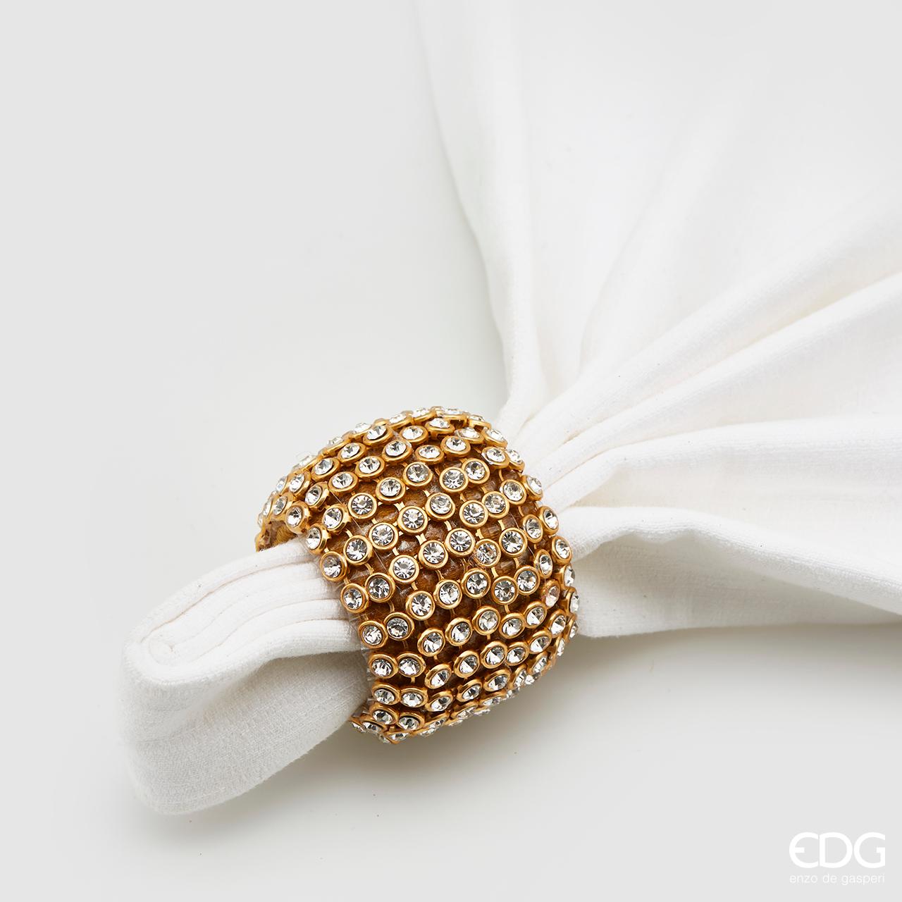 Legatovagliolo tondo color oro decorato con tessuto e strass. Dimensioni: Ø cm 6. In negozio e online su tuttochic.it