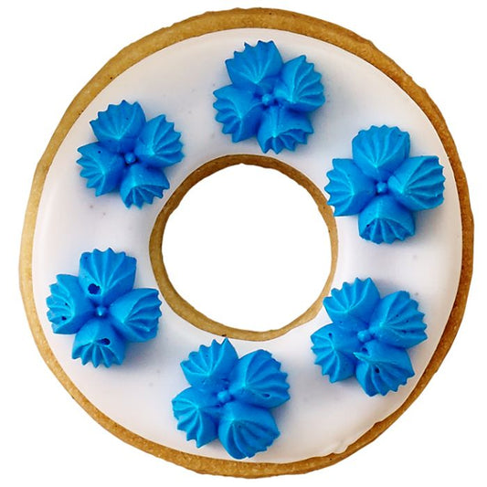 Bocchetta N. 104 di design per sac a poche realizzato in un unico pezzo in acciaio inox, ideale per creare decorazioni artistiche su cupcake, crostate e pasticcini. Dimensioni: 3,0 x 3,0 x 4,1 cm, foro di uscita Ø 17 mm. In negozio e online su tuttochic.it