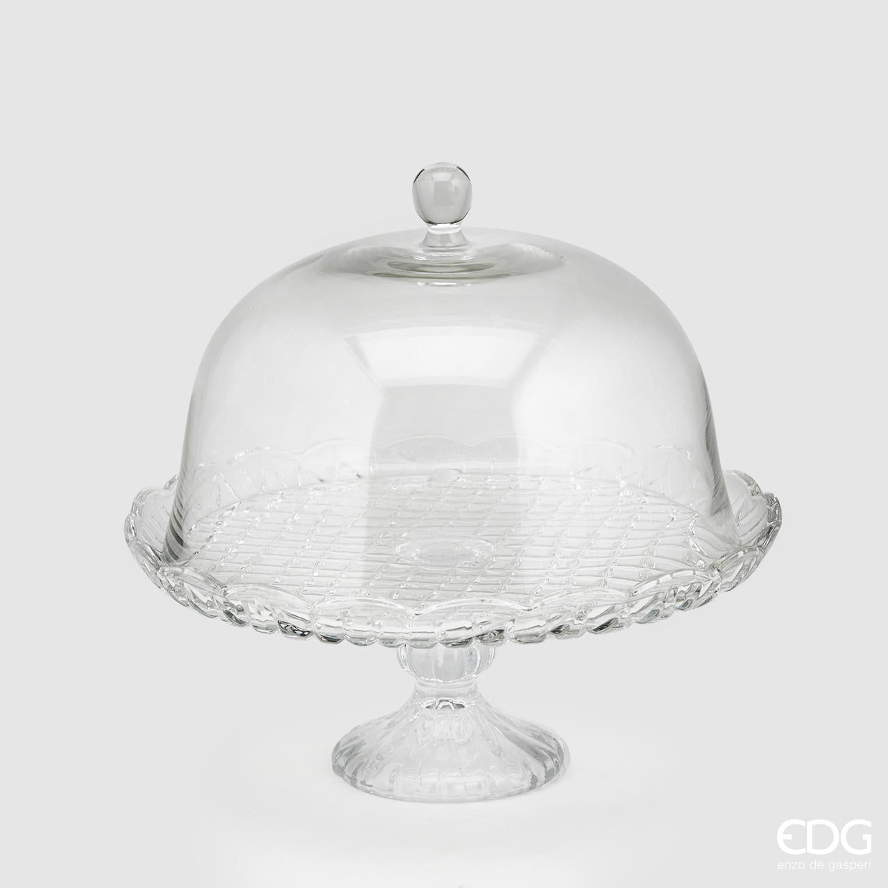 Alzata in vetro lavorato con cupola in vetro trasparente. Dimensioni: diametro cm 31- altezza cm 30. In negozio e online su tuttochic.it