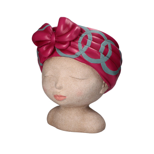 Cachepot in resina con turbante decorato di colore fucsia. Dimensioni: cm 20 x 19 x 34 h. CON… TURBANTE BELLEZZA Ad occhi aperti le vedi, ad occhi chiusi le sogni. Le donne del Sud America hanno una conturbante bellezza. Femminili cachepot da collezione, omaggio a Carmen Miranda. In negozio e online su tuttochic.it
