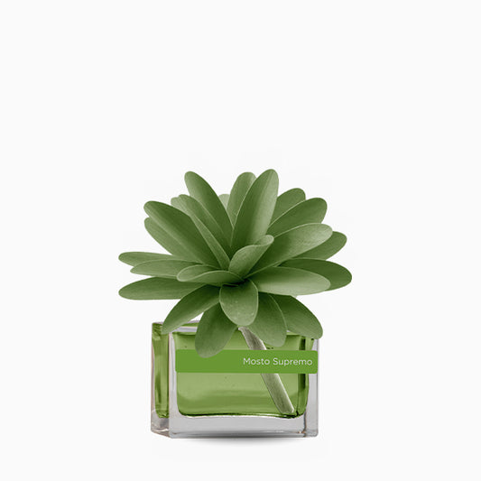 Profumatore d'ambiente con fiore in legno colorato, bottiglia in vetro rettangolare con 30 ml di fragranza. In negozio e online su tuttochic.it