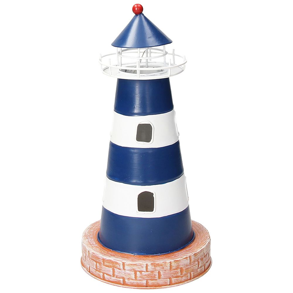 Faro marino in metallo colorato. Dimensioni: cm 12,2 x 25 h. In negozio e online su tuttochic.it
