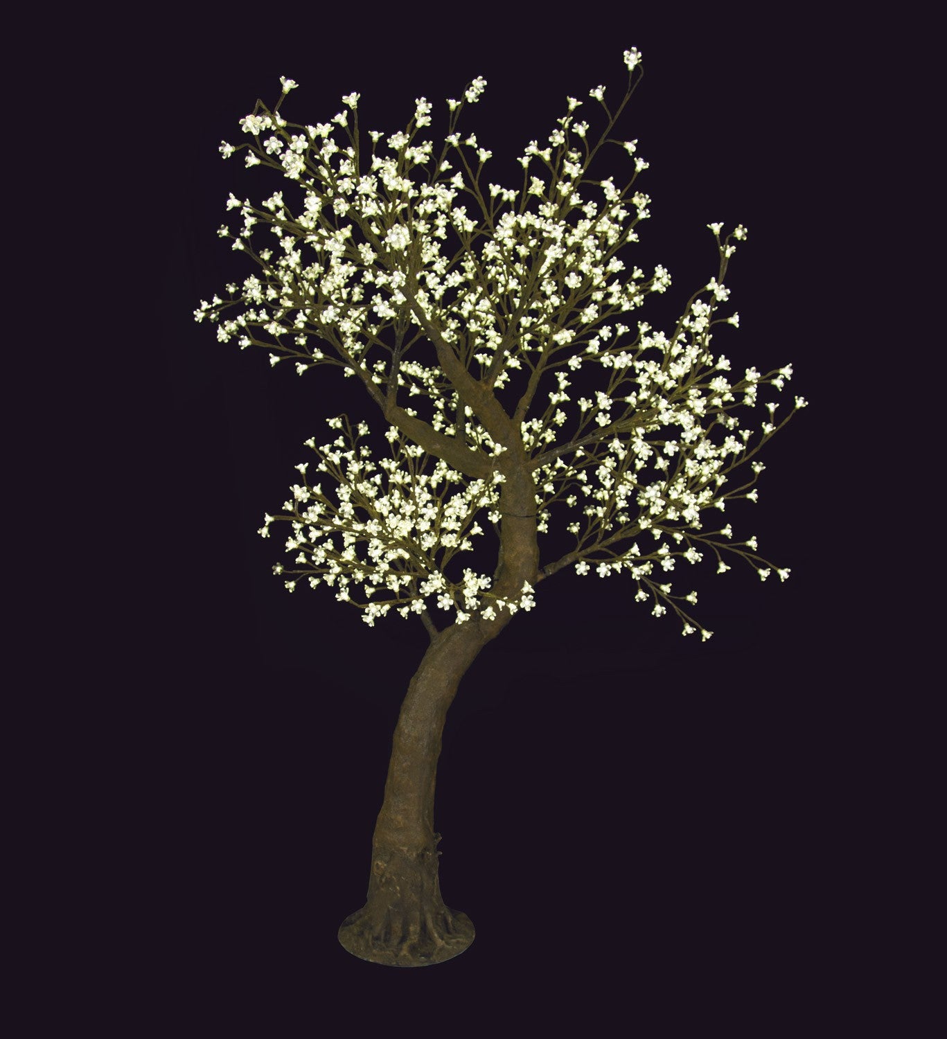 Albero Melo fiorito con 880 led Composto da 1 fusto + 11 rami. Dimensioni: altezza 1,8 mt - Diametro 1,5 mt - Base ø 36 cm. Luce a LED calda. In negozio e online su tuttochic.it
