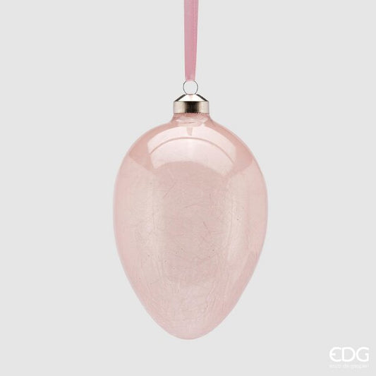 Uovo in vetro da appendere di colore rosa. Dimensioni: Ø 9,5 x 13,5 h. In negozio e online su tuttochic.it