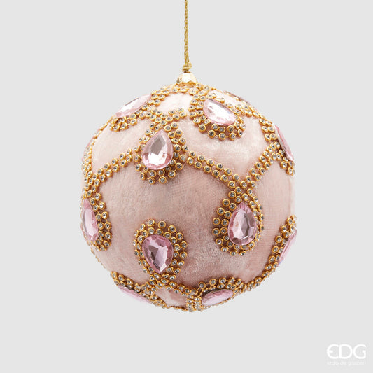 Realizzata in tessuto rosa effetto velluto con gemme e strass color oro. Dimensioni: Ø 10 cm. In negozio e online su tuttochic.it