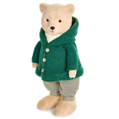 Porta l'incanto dell'inverno a casa tua con l'orso peluche "Bear Wonderland"! Realizzato in morbido poliestere e vestito con un adorabile vestitino in cotone disponibile in due colori, rosso o verde. Dimensioni: verde17x18x38 cm - rosso 17x18x40 cm. In negozio e online su tuttochic.it