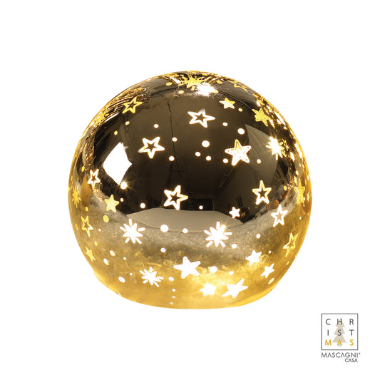 Realizzata in vetro color oro lucido con decoro stelline. Ø 10 cm. led intermittenti Funziona con 3 batterie  stilo incluse. In negozio e online su tuttochic.it