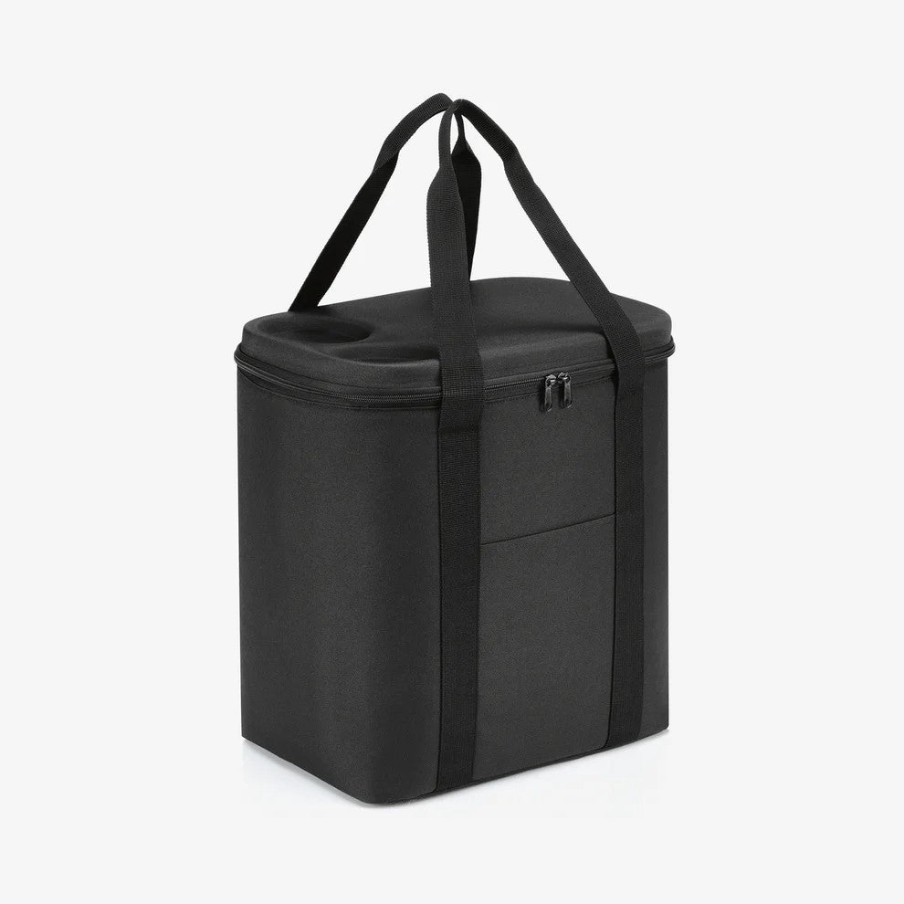 Coperchio rinforzato della Coolerbag XL Reisenthel utilizzato come piano d'appoggio.