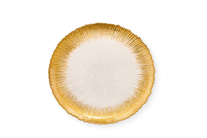 Sottopiatto natalizio in vetro trasparente con fitta lavorazione a raggi e finitura sfumata color oro lucido, diametro 33 cm, collezione Silent Gold Nuvole di Stoffa, Tutto Chic.