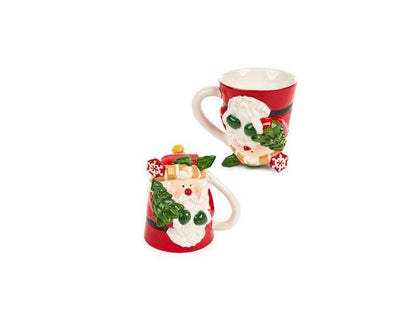 Tazza Babbo Natale della collezione "Cartoline di Natale" di Nuvole di Stoffa. Realizzata in ceramica decorata, questa tazza unica è disponibile in due modelli diversi e poggiata al contrario, si trasforma in un'originale oggetto d'arredo. Capacità 300 ml. In negozio e online su tuttochic.it