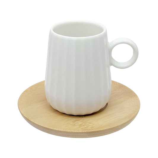 Set di 6 tazzine da caffè INTAVOLA! Realizzate in fine porcellana lavorata con piattino in legno. Capacità: 90 ml Dimensioni: cm Ø 10 x h 8. In negozio e online su tuttochic.it