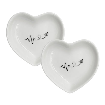 2 ciotoline a forma di cuore per alimenti in porcellana bianca decorata. Dimensioni singolo pezzo: cm 7,5 x 7,5 x h 1,5. In negozio e online su tuttochic.it
