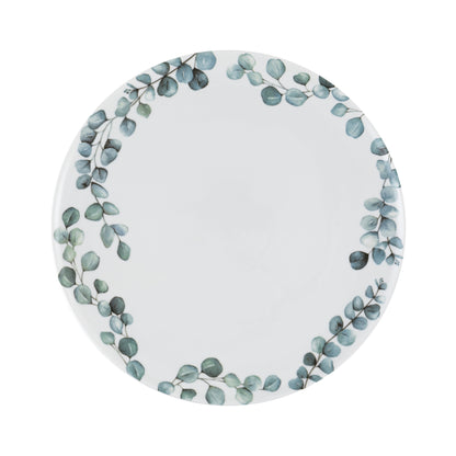 Piatto portata tondo Sempreverde in porcellana decorata unisce l’eleganza della satin porcelain alla delicata bellezza della natura. Ø cm 32 x h 1,3. In negozio e online su tuttochic.it 