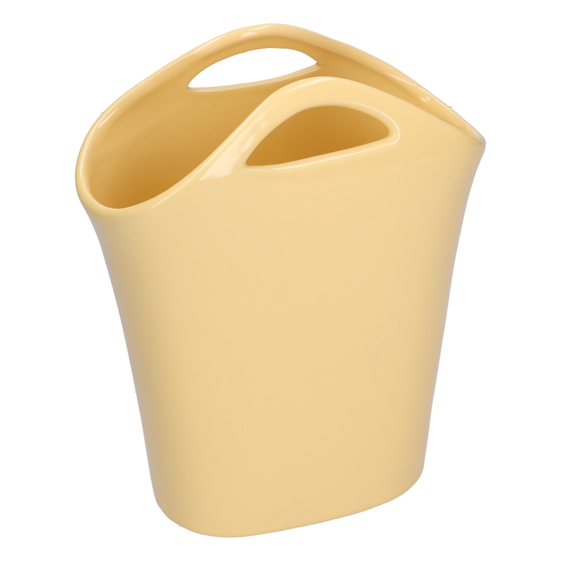 Vaso a forma di borsa in gres dai colori pastello che si abbinano facilmente ad ogni ambiente. Dimensioni: cm 19 x 8.5 x 23 h. In negozio e online su tuttochic.it