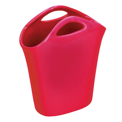 Vaso a forma di borsa in gres dai colori pastello che si abbinano facilmente ad ogni ambiente. Dimensioni: cm 19 x 8.5 x 23 h. In negozio e online su tuttochic.it