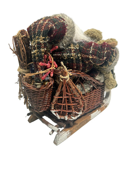 Babbo Natale su slitta con orsacchiotto e lanterna