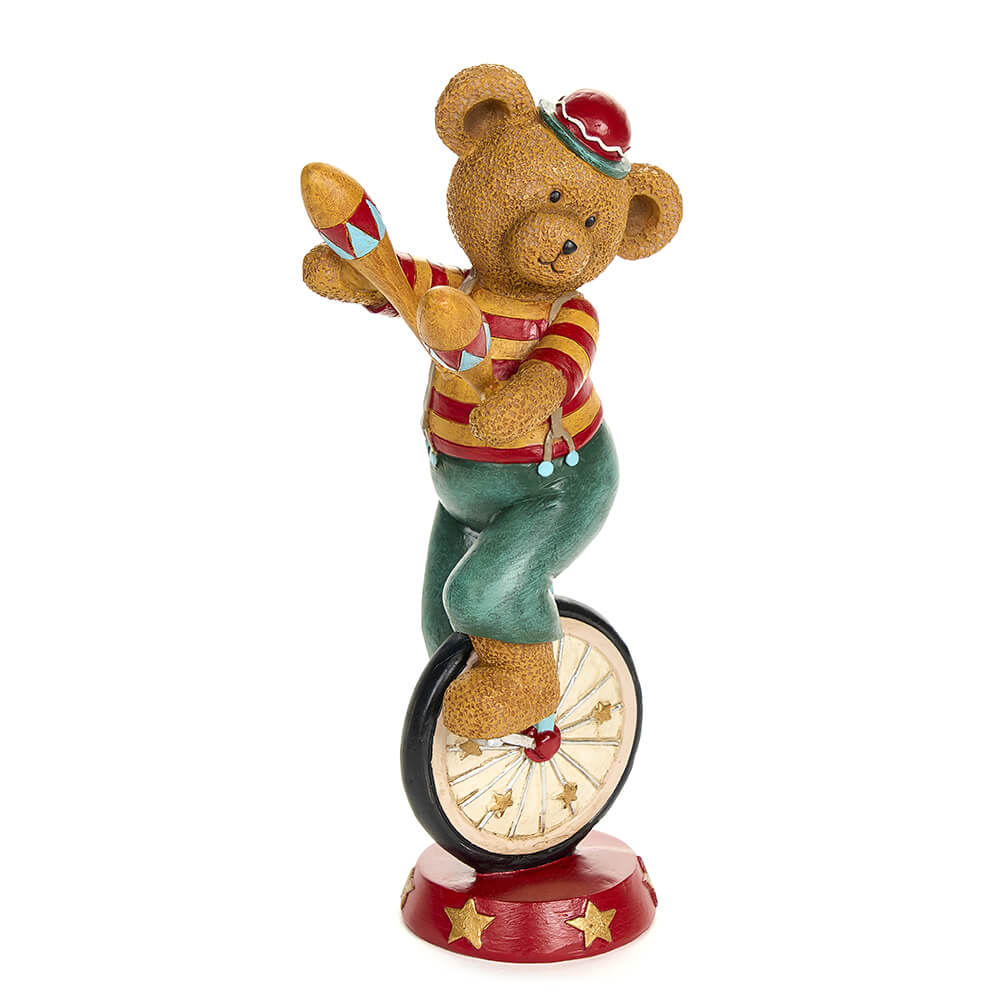 Porta l'incantevole magia del Natale a casa tua con Orso Giocoliere della collezione "Bear Wonderland". Questa statuetta in resina decorata trasmette un'atmosfera incantata e natalizia, perfetta per un tocco di eleganza e fascino nella tua casa. Dimensioni: cm 13 x 11 x 28.5. In negozio e online su tuttochic.it