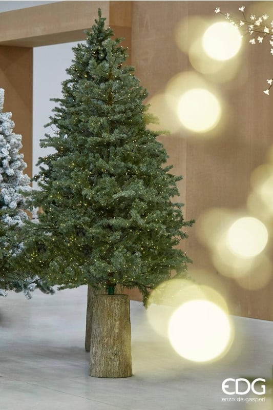 Base tronco in cemento effetto legno per alberi di Natale. Dimensioni: cm Ø 22 x h 45+6 tubo con diametro da  37 mm, ideale per tutti gli alberi che non superano l'altezza di cm 180.  Cemento + metallo  (9 Kg). In negozio e online su tuttochic.it
