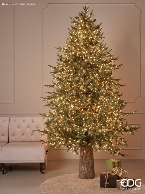 Pino Luxury, albero di Natale alto 210 cm con 4000 mini led, diametro di 142 cm con 3387 rami (2412 PE+ 975 PVC) . Base in metallo Facile da montare e da riporre Materiale ignifugo e atossico Apertura rami albero ad ombrello Colore: Verde. 230V Consumo 15W. In negozio e online su tuttochic.it