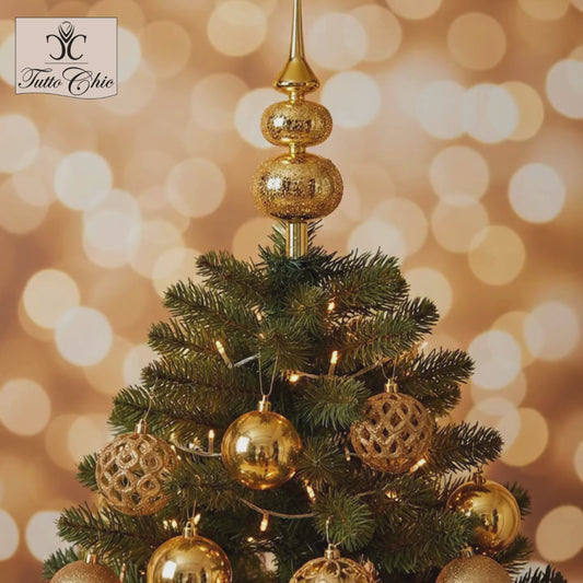 Grande puntale per albero di Natale in vetro soffiato color oro lucido, altezza 35 cm, caratterizzato da lancia liscia e due sfere sovrapposte con texture a rilievo effetto diamantato, brand EDG.