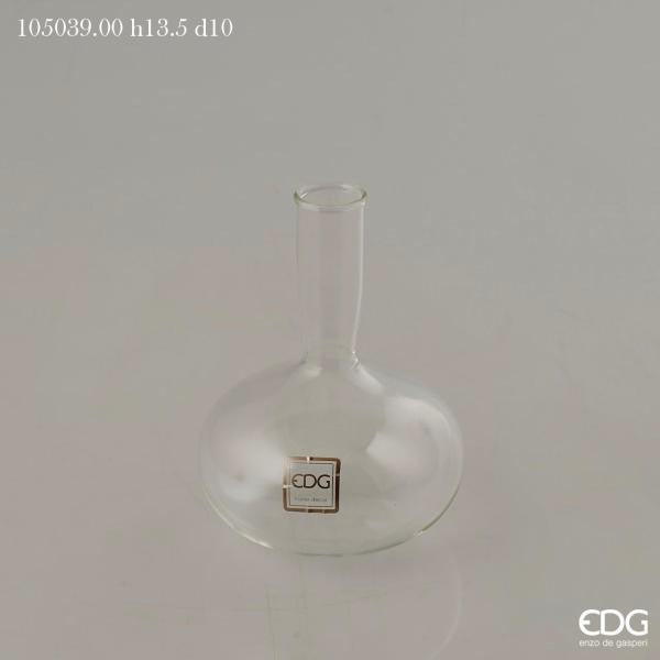 Vasetto ampolla in vetro trasparente, ideale come vaso monofiore o ampolla per profumi ambiente. Dimensioni: cm ø 10 x h 13,5 (diametro bocca cm 2,5). In negozio e online su tuttochic.it