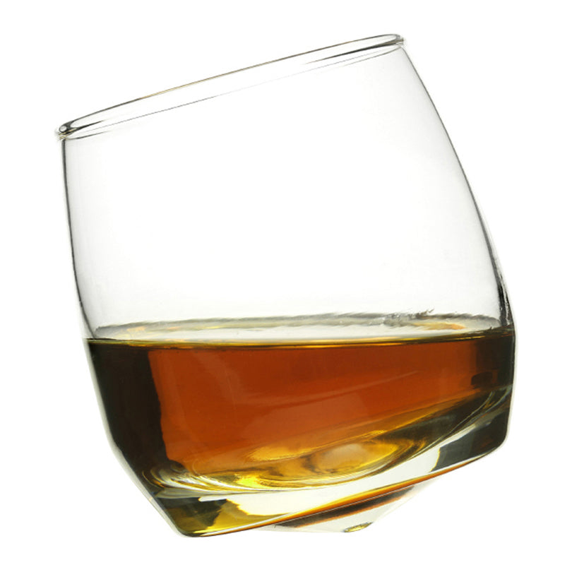 Set di 6 bicchieri in vetro basculanti ideali per whisky, rum e distillati di ogni tipo. Dimensioni cm 8 x 8 x 9 h ; Cl 20. In negozio e online su tuttochic.it