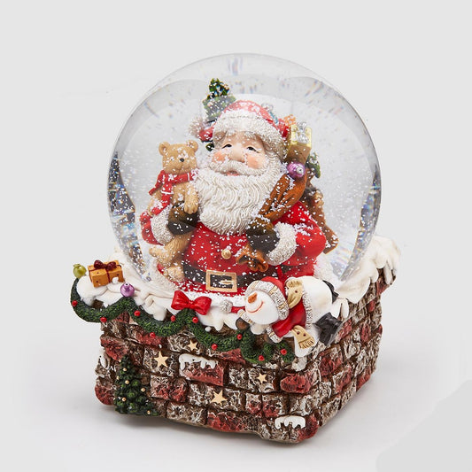 Sferacqua in resina decorata con Babbo Natale in acqua con neve e carillon a corda. Dimensioni: cm 16 x 20 h. In negozio e online su tuttochic.it
