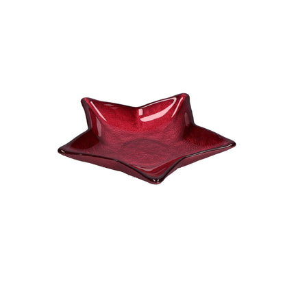 Piattino in vetro di colore rosso a forma di stella. Dimensioni: Ø 16 cm. In negozio e online su tuttochic.it