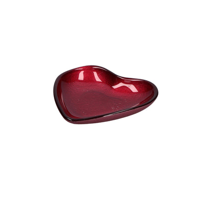 Piattino in vetro di colore rosso a forma di cuore. Dimensioni: Ø 14 cm. In negozio e online su tuttochic.it