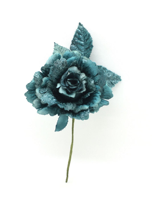 Rosa artificiale in tessuto di colore turchese con glitter. Dimensioni: cm 10 x 18 h. In negozio e online su tuttochic.it