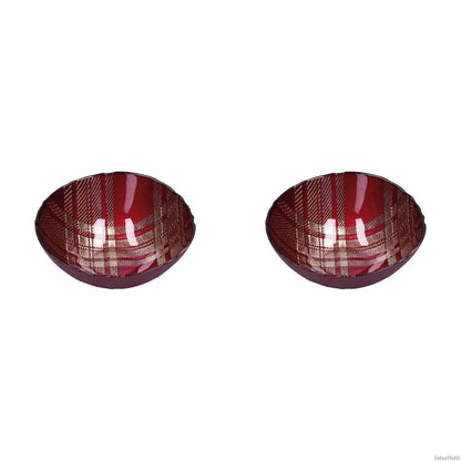 Set di 2 ciotole in vetro decorato color oro e rosso. Dimensione: singola Ø 16; h 6 cm. In negozio e online su tuttochic.it